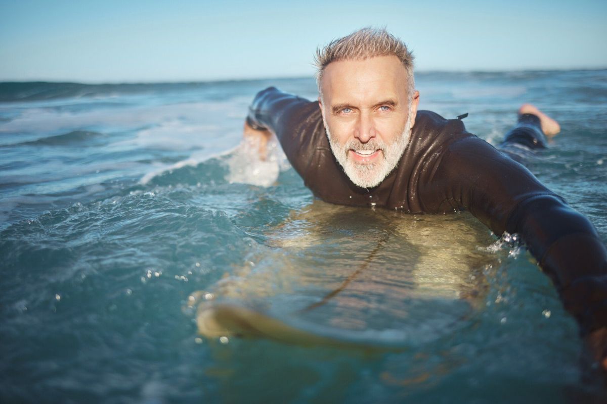 Water beach and man surfing for the waves for adv 2023 11 27 05 05 17 utc