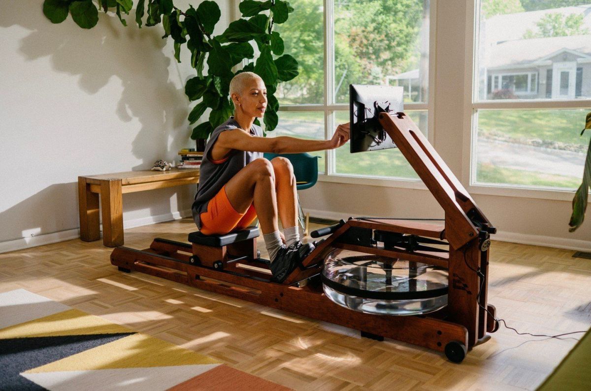 Woman using egratta rower