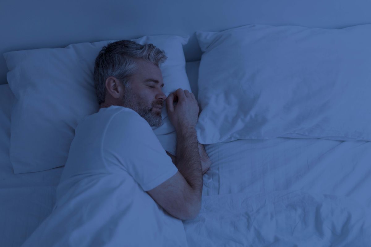 Top view of man sleeping alone in bed at night 2023 11 27 05 07 32 utc