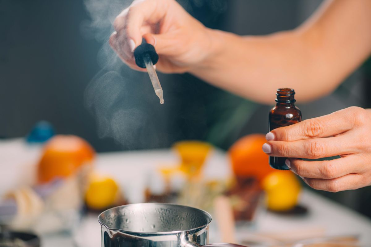 Woman preparing homemade soap with essential oil e 2023 11 27 04 52 50 utc